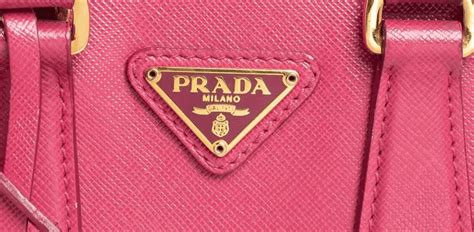 how to tell real prada from fake|Prada authentic handbags guide.